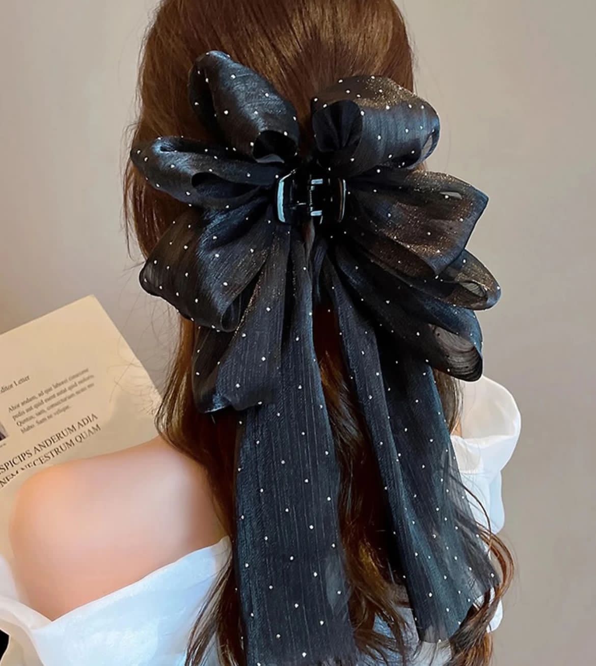 Large black bow clip